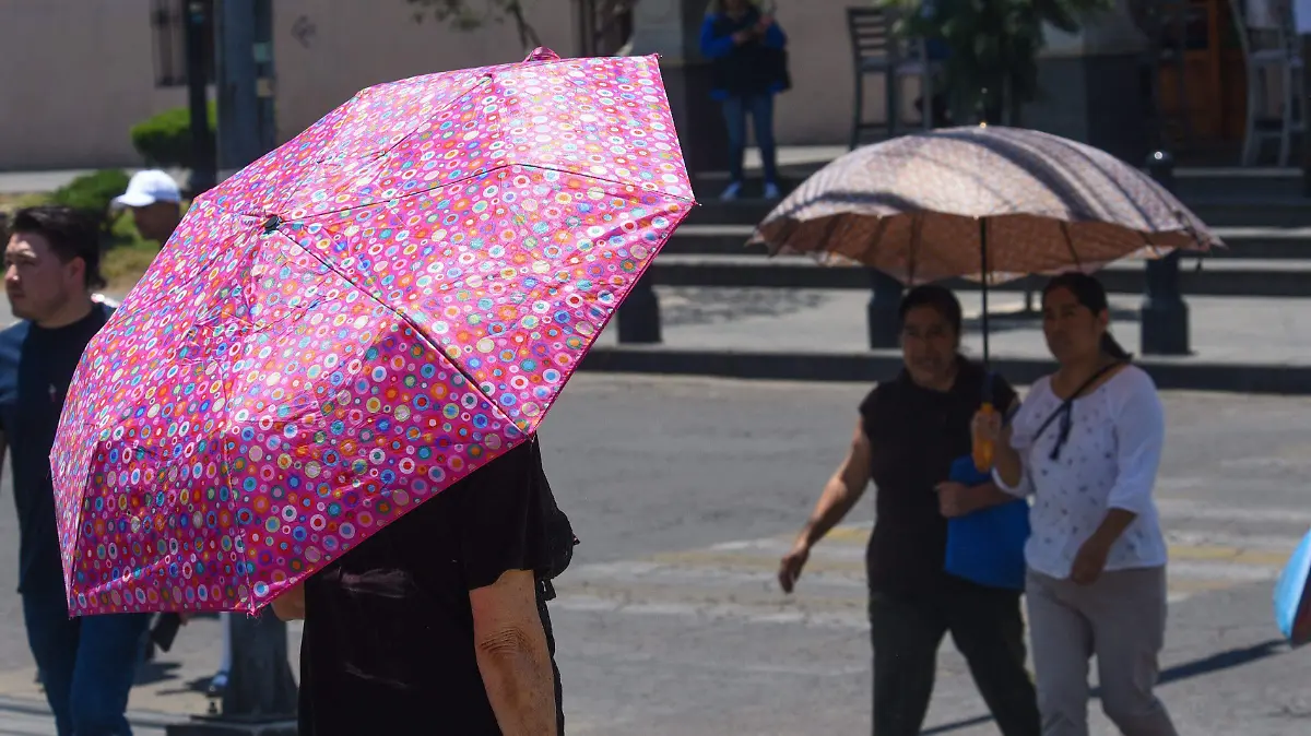 936533_Uso de sombrillas por altas temperaturas -3.jpg _impreso